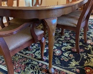 (F18) $250. Formal Dining Room Table with 2 leaves and 6 matching chairs - 4 regular and 2 captains chairs. Overall the set is in very good condition. There are a couple spots on the table top where a hot pan has been set and made a light mark in the finish. No holes or grooves!