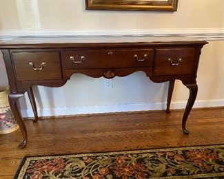 (F33) $225. Cochrane Brand. Queen Anne style Sideboard. 18" deep x 60" long x 34" tall. Overall very good condition - top does have one ring from a lamp (see photos) 