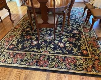 (R1) $100. Shaw Living - Area rug in the Dining Room. Measures 7'9" x 10' 10"