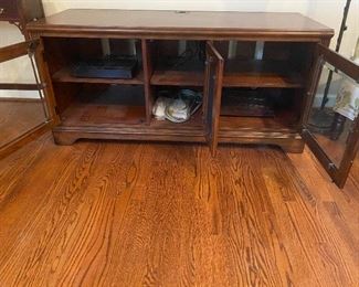 (F36) $150. Hooker Furniture Entertainment Stand very good condition.  Measures 22" deep x  56" wide x 26" tall. 