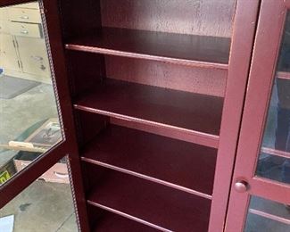 $250. Carolina Wood Products - custom-made bookcase. Adjustable shelves. Nice dark red color. 