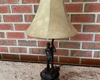 (L12) $20. 24” tall. Golfing lamp missing the club. 