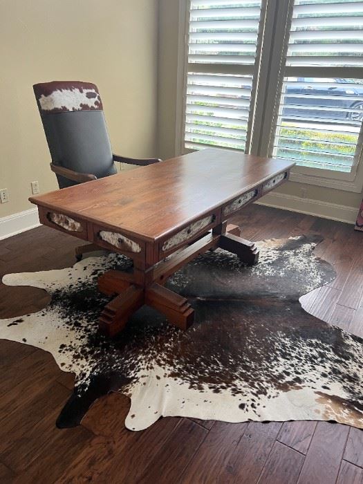 Cowhide rug, desk and office chair
