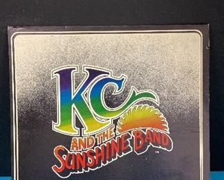 LP Record - set of 2 albums by KC and the Sunshine Band. KC and the Sunshine Band with cover and paper sleeve. KC and the Sunshine Band Greatest Hits with cover and paper sleeve.