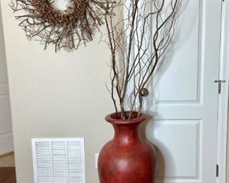 Large Rust Colored Floor Vase with Branches and Wreath
