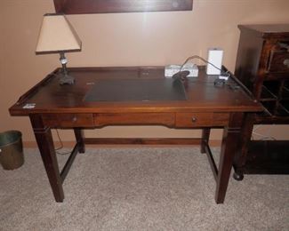 Solid Mahogany Antique Arts and Crafts Desk with backsplash, built in inkwell, inset real leather blotter and 2 drawers....solid as a rock