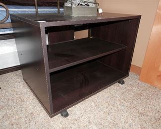 Basic modern TV stand with rollers