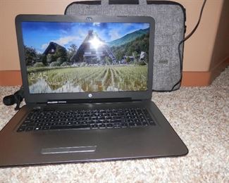 Unlocked HP 15" laptop...AMD processor,  good battery, nice carrying case and ac power supply