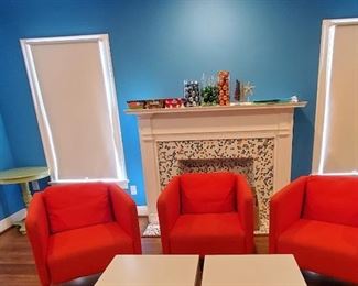Set of 3 bright orange fabric armchairs; Wooden light green pedestal table