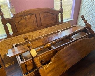Queen size bed with drawers underneath. 
