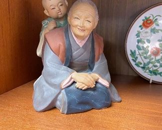 Japanese Hakata Urasaki Grandmother and child figurine