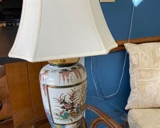 Vintage rattan glass top table and decorative Leviton lamp 30" tall
