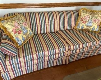 Two seat upholstered sofa in formal living room