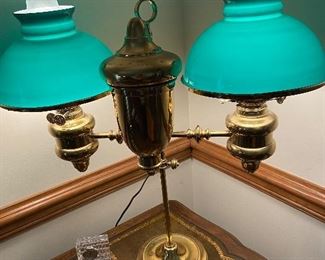 brass lamp with green glass shades