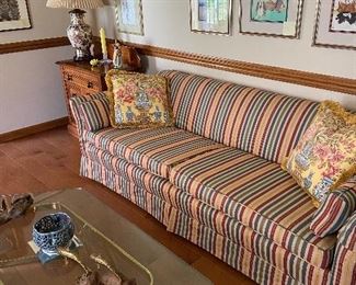 Lovely Formal Living Room, glass coffee table has matching glass etagere and two matching side tables