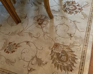 Lazarra Bisque rug in dining room, 79" x 116"