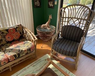 Vintage Ficks Reed rattan furniture including Lobster Trap glass-top table and giraffe figurine