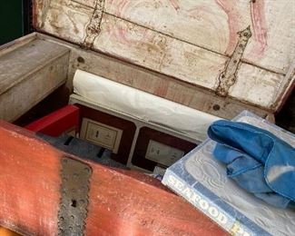 Antique travel trunk with original large key.  Painted side says Rudsford, Minnesota 