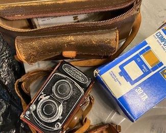 vintage Minolta camera and case and accessories