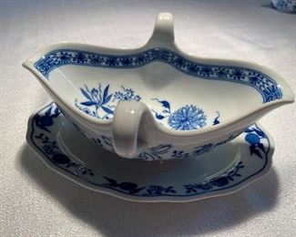 gravy boat with handles and attached under plate, sold separately, excellent condition