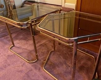 glass and brass tables, has matching cocktail-coffee table and etagere in formal living room