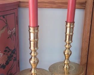 pair of brass candlesticks, tall 49" with candle, shorter 45" with candle