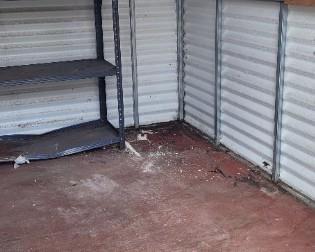 interior of Leonard metal shed-you haul away