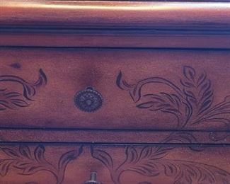 close-up of vintage Bombe chest, made in the Phillipines