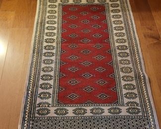 Hand woven rug 51" x 32"