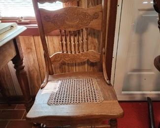 One of the oak chairs that go with the farm table 