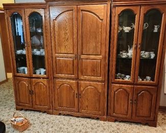 Large entertainment center - mint condition - breaks down in 3 pieces. Is lighted