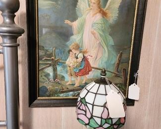 Small Tiffany style lamp and religious picture
