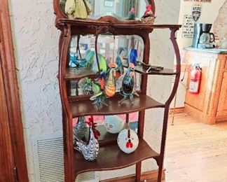 Antique mirrored shelf, glass chickens 