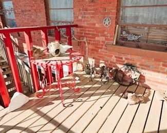 Red patio table sold with two red matching chairs not in picture. Photo following this picture 
