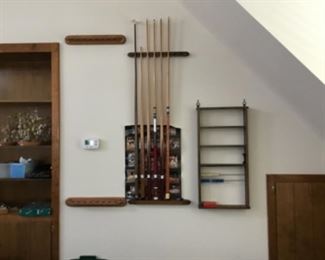 cue sticks and pool balls