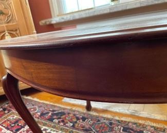 Rounded tall leg table