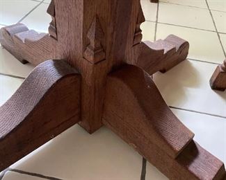 6 chair, round wooden table with light pink cushions 