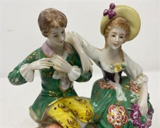 Porcelain figure man and woman 