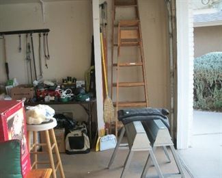 ladders, saw horses, pet carrier & bed, stool, garden tools
