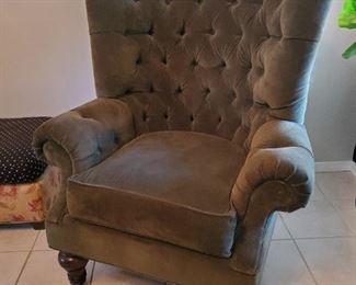 Beautiful Forrest green tufted wing back chair