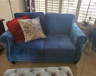 Royal Blue velvet couch with silver studs