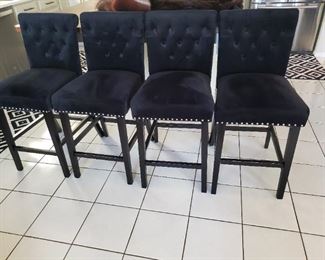 4 black velvet tall chairs with silver studs
40 inches high