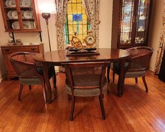 Table has one leaf in it plus another, also includes pads. Chairs are Hickory, there are six. 