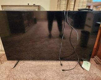 Fairly new Samsung 55" UHD TV, model #QN55Q70TAF Master bedroom