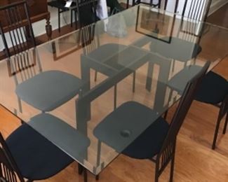 Stunning glass top dining room table.