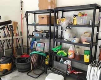 A lot of miscellaneous outdoor and garden supplies. As well as outdoor tools