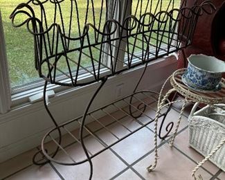 Scrolled • Iron • Plant Stand • 32 1/2”h x 37 1/2”w x 15 1/2”d • $60