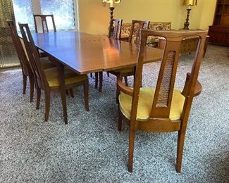 27_____$950 
MCM Drexel dining table mahogany 40L or 79L x 42W
4 chairs & 2 captain 40"T x23W 
