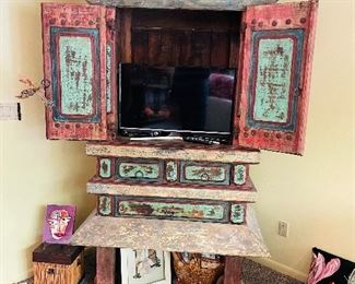 3_____$950 
Asian style Primitive polychrome cabinet 84H x 57Wx 32D 3 drawers 