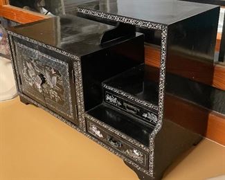 63_____$250 
Lacquer jewelry box 24x10x16 with mother of pearls birds and designs 